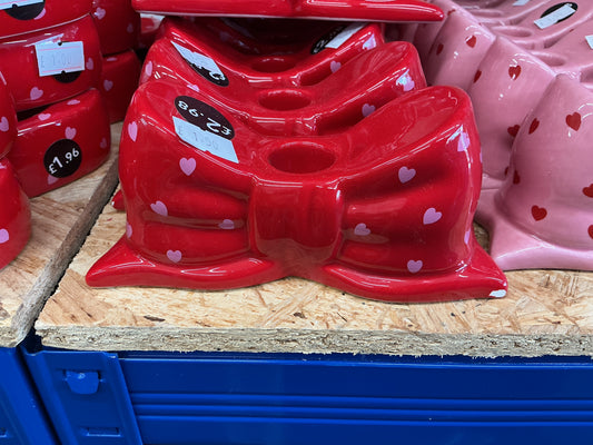 Red bow candle holder